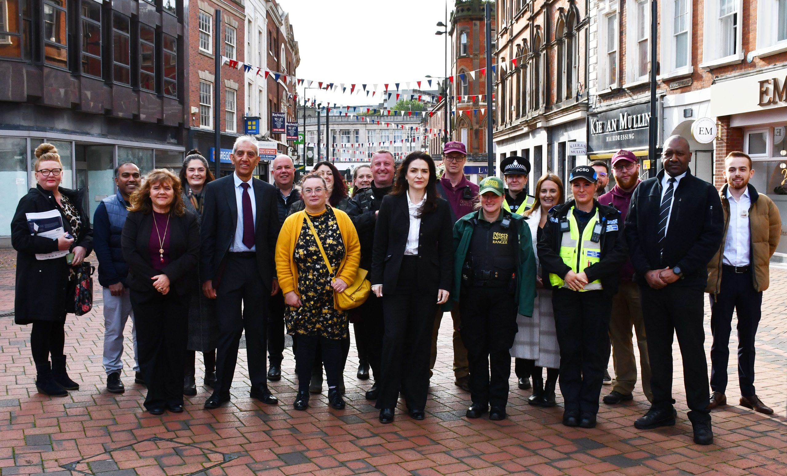 Commissioner Angelique Foster with Derby retailers and business partners